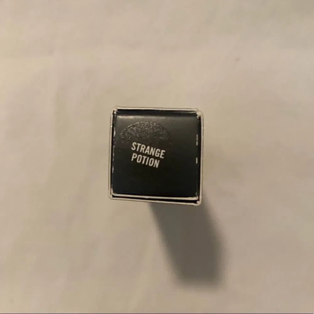 NIB MAC Venomous Villains Lipglass in “Strange Potion”